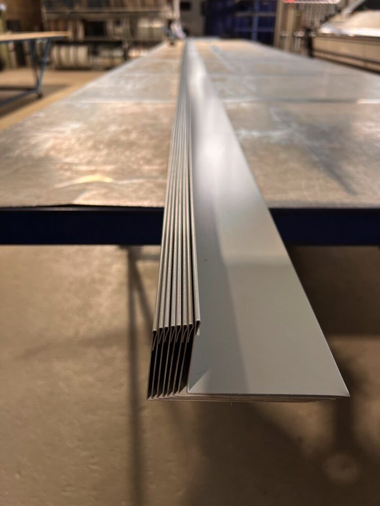 North Central Sheetmetal colorbond flashing on a work table